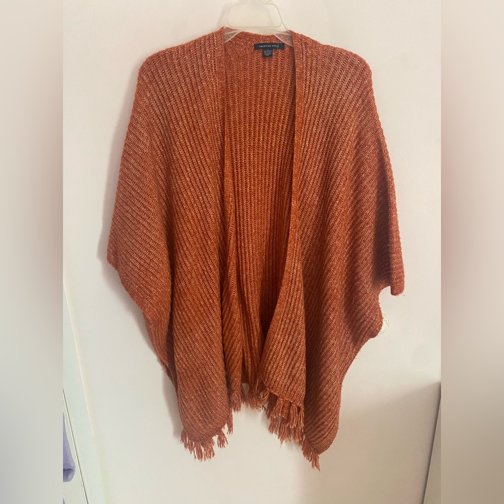 Orange sweater poncho